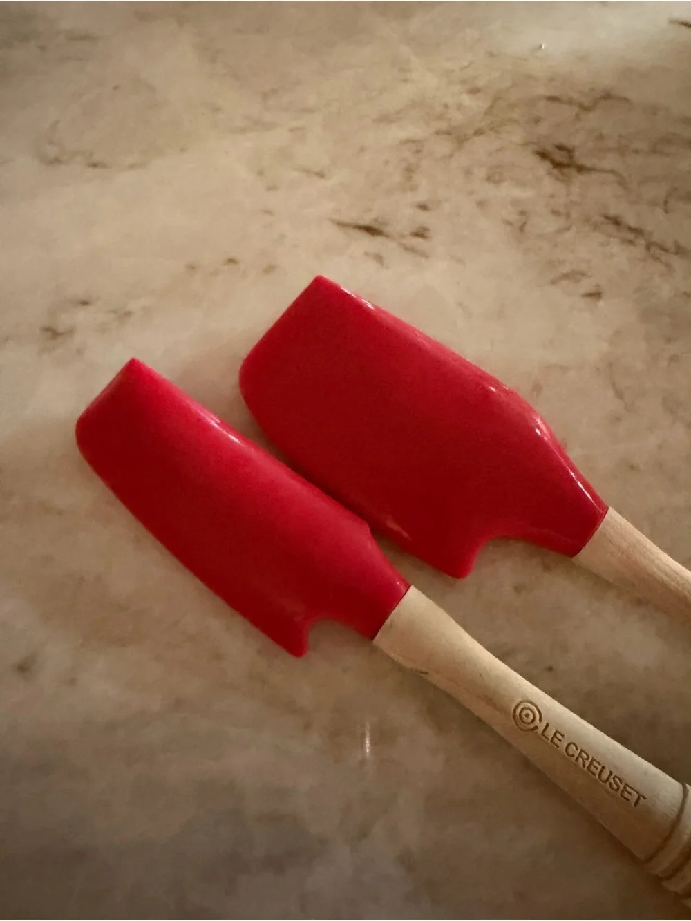 Le Creuset silicone mixing spatulas in Cerise (red)